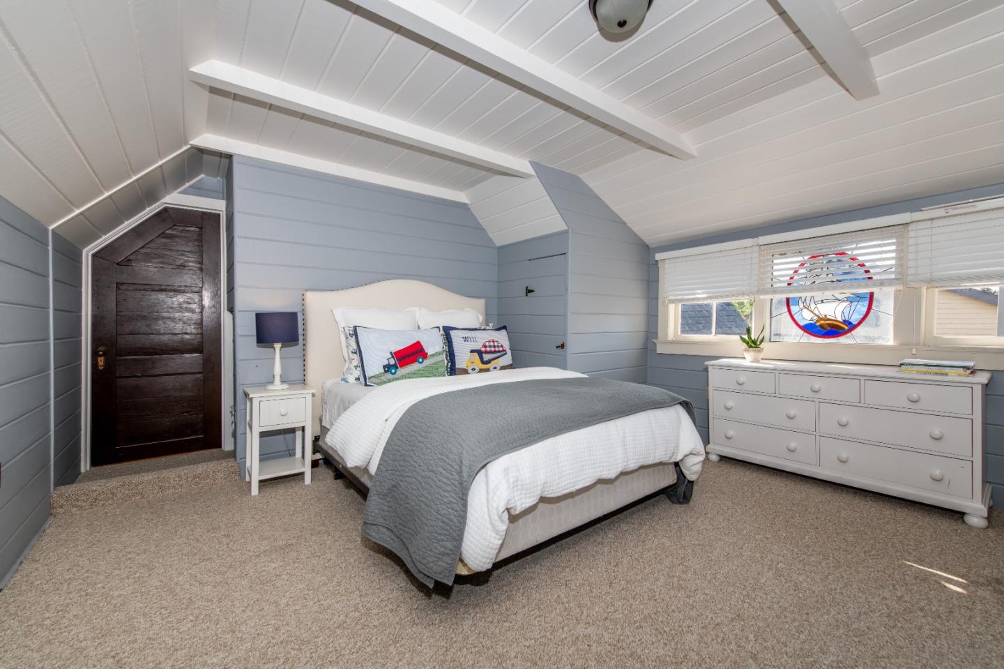 843 Crossway Road Burlingame, CA 94010 - Photo 19 of 36 a bedroom with a bed and a cabinets