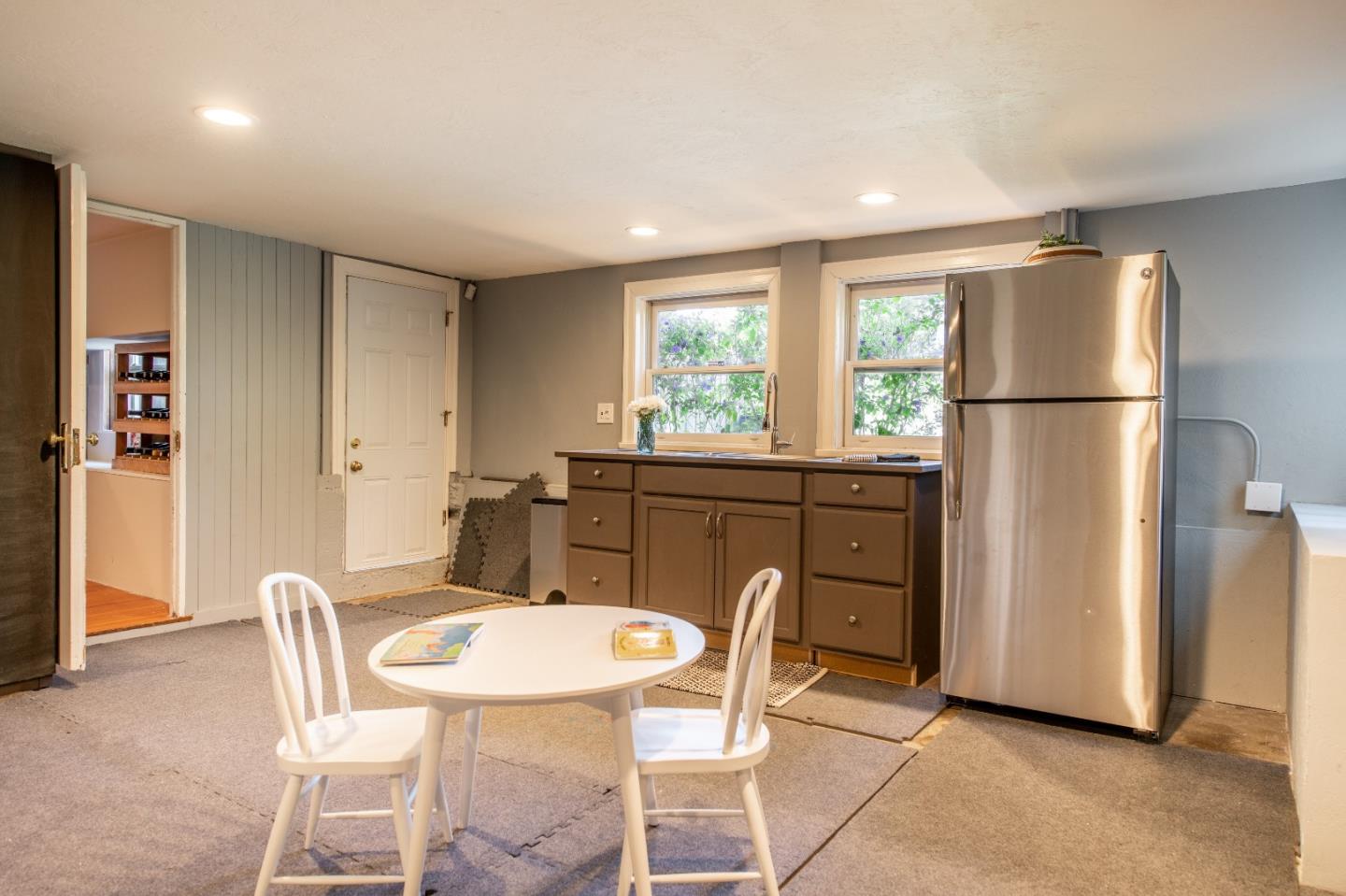 843 Crossway Road Burlingame, CA 94010 - Photo 26 of 36 a view of a dining room with furniture window and outside view