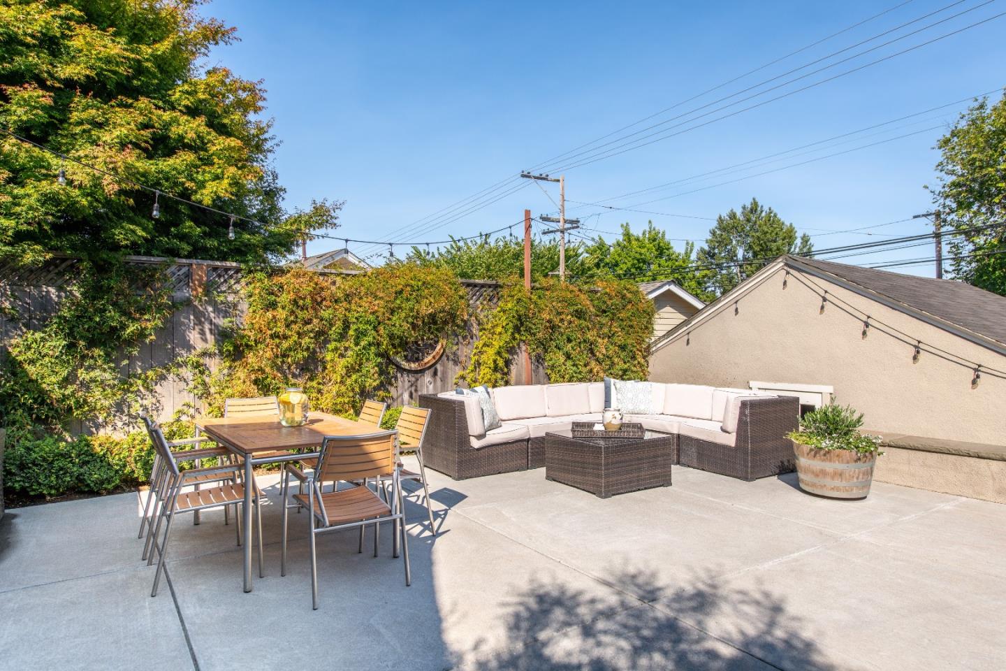 843 Crossway Road Burlingame, CA 94010 - Photo 35 of 36 a view of a patio with table and chairs and potted plants