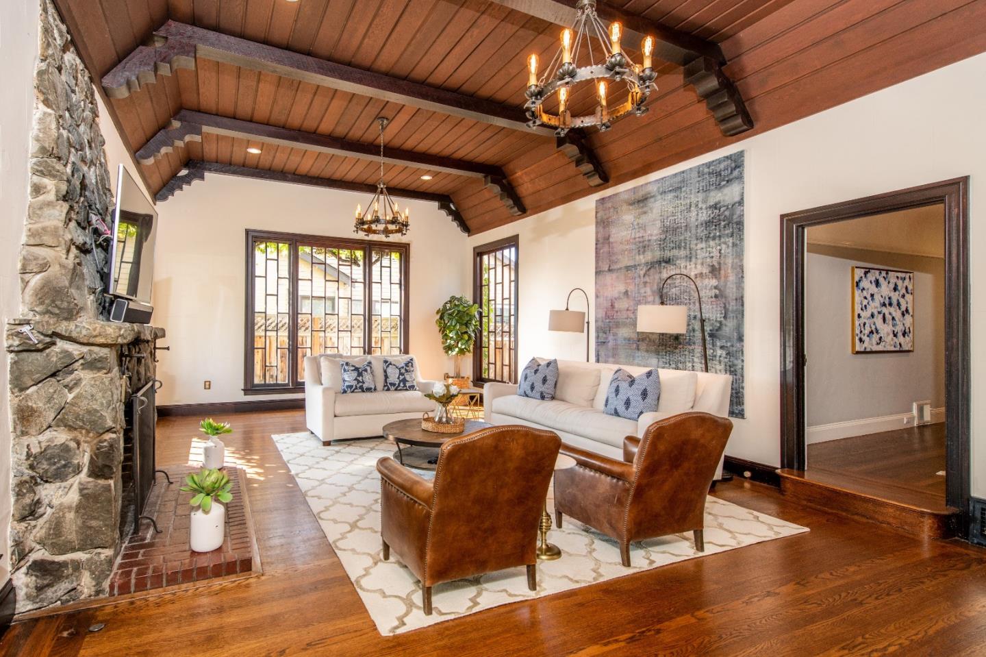 843 Crossway Road Burlingame, CA 94010 - Photo 5 of 36 a living room with furniture and a large window