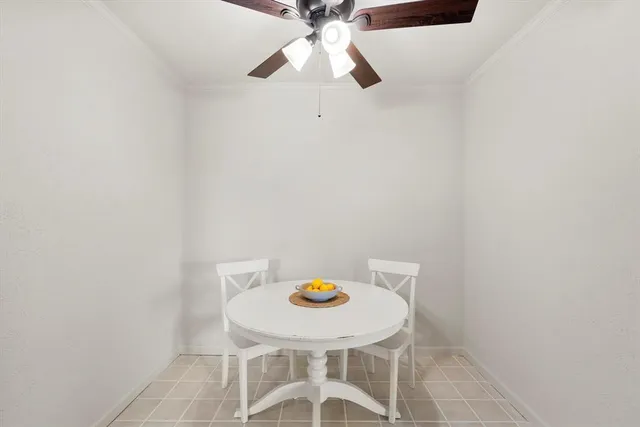 a view of a bedroom with furniture and wooden floor