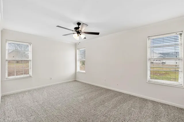 a view of a big room with carpet