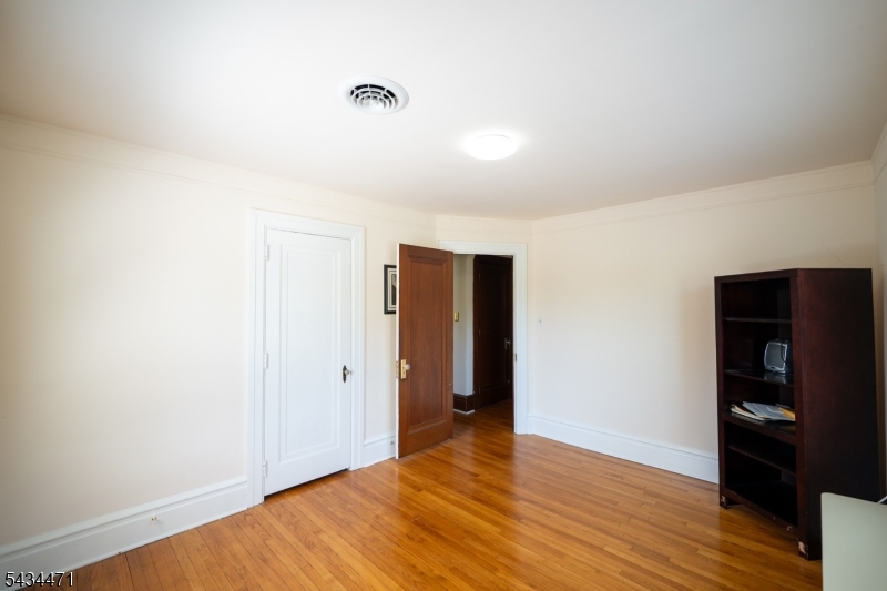 192 Lincoln Road Phillipsburg, NJ 08865 - Photo 33 of 50 a view of an empty room with wooden floor