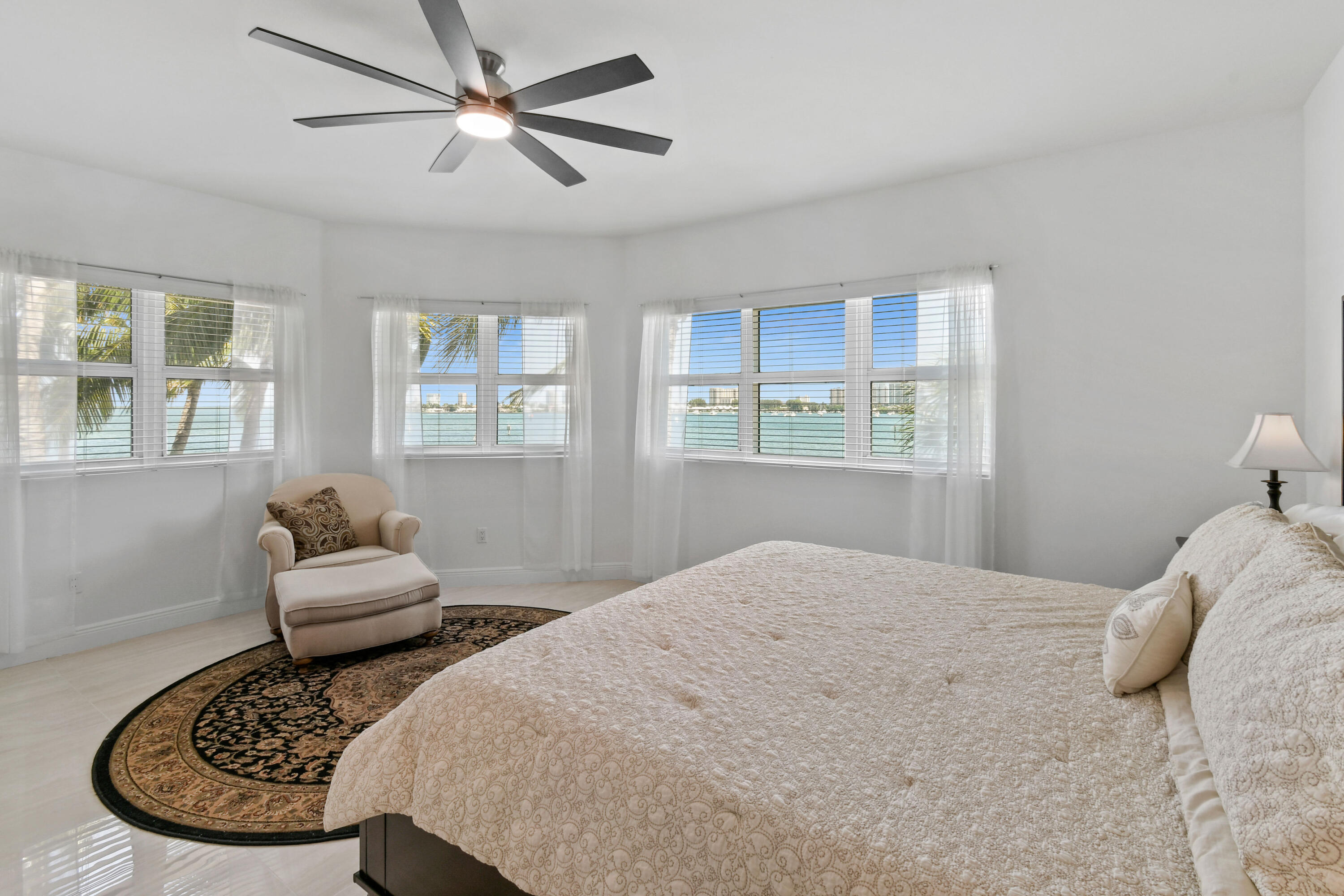 2640 Lake Shore Drive, Unit 207 Riviera Beach, FL 33404 - Photo 19 of 54 Primary Bedroom
