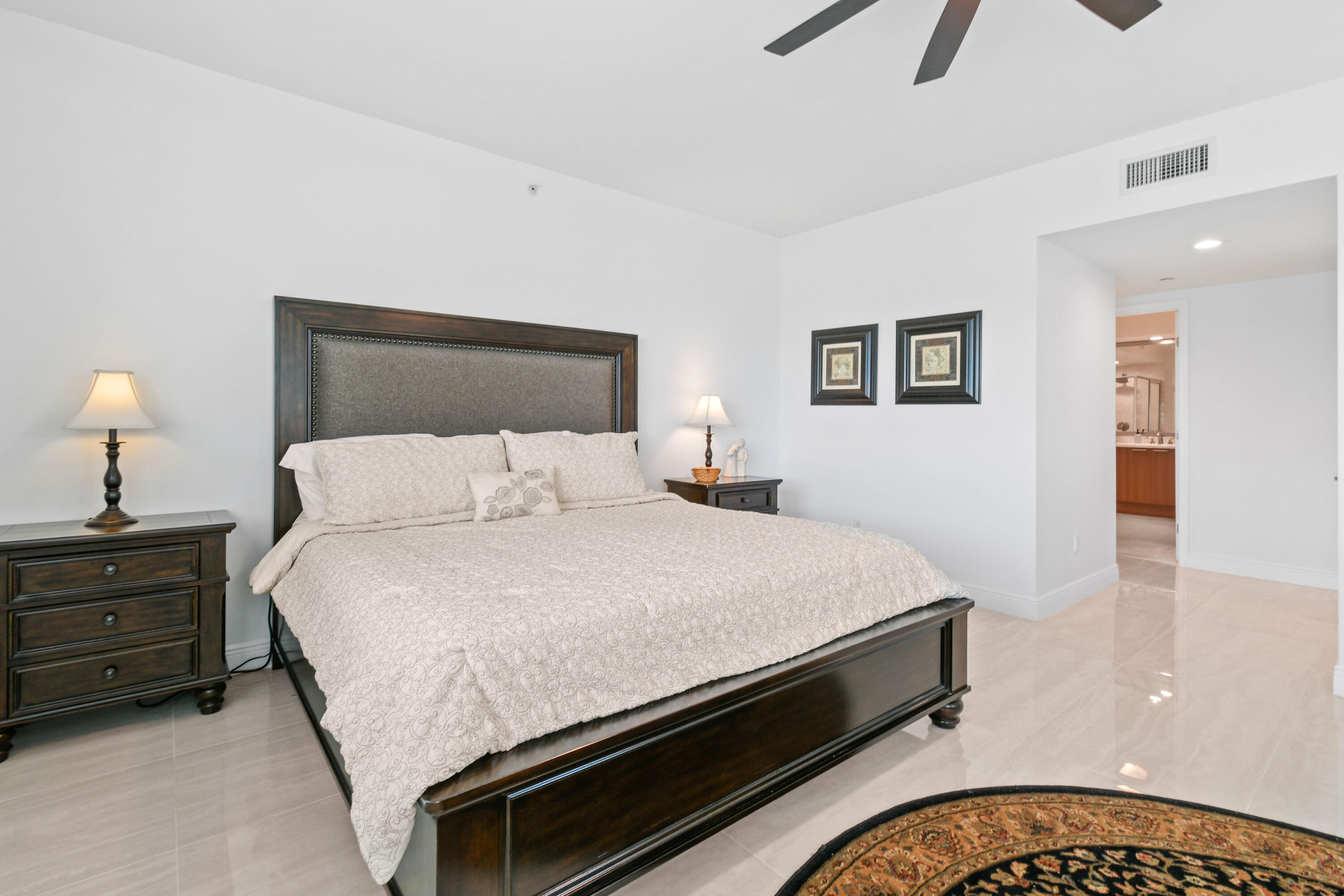 2640 Lake Shore Drive, Unit 207 Riviera Beach, FL 33404 - Photo 21 of 54 Primary Bedroom