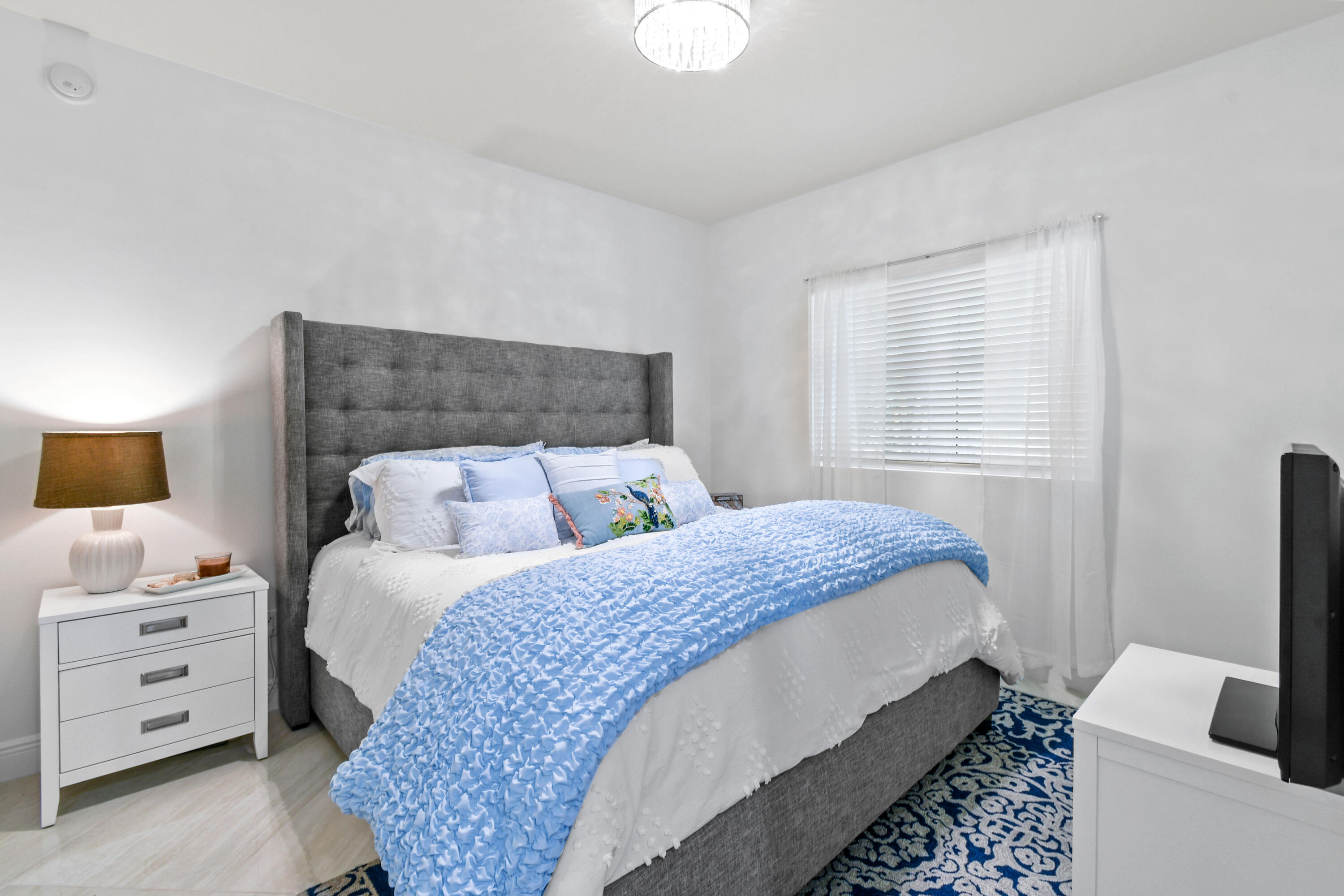 2640 Lake Shore Drive, Unit 207 Riviera Beach, FL 33404 - Photo 29 of 54 Guest Bedroom 1