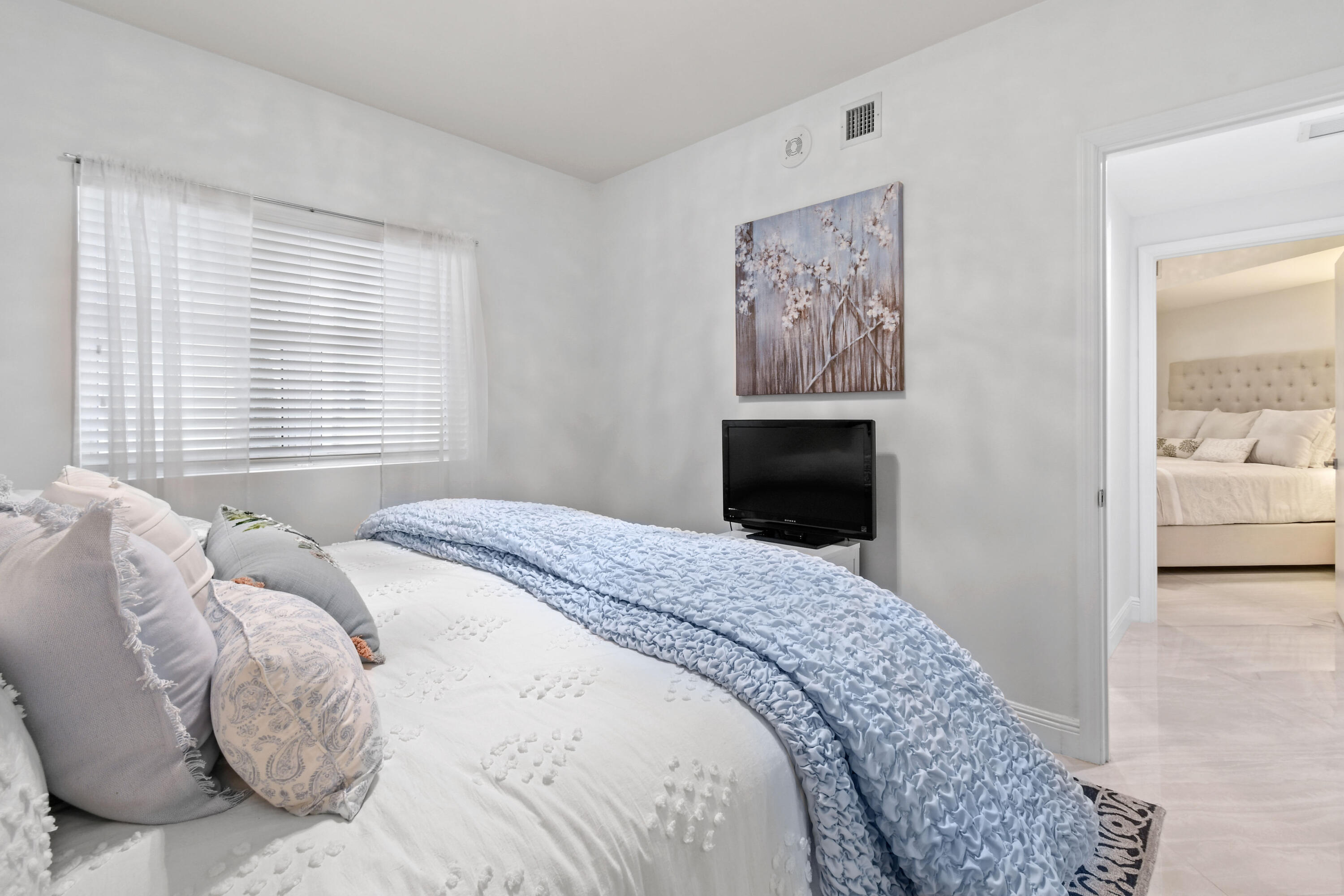 2640 Lake Shore Drive, Unit 207 Riviera Beach, FL 33404 - Photo 30 of 54 Guest Bedroom 1