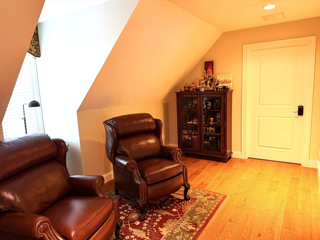4 Tamarack Lane Sandwich, MA 02563 - Photo 31 of 42 a living room with furniture and wooden floor