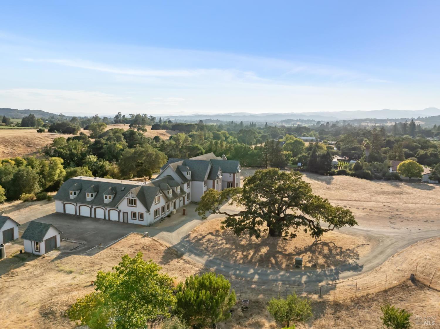 5151 Wild Horse Valley Road Napa, CA 94558 - Photo 20 of 81 a view of a terrace with a garden and mountain view