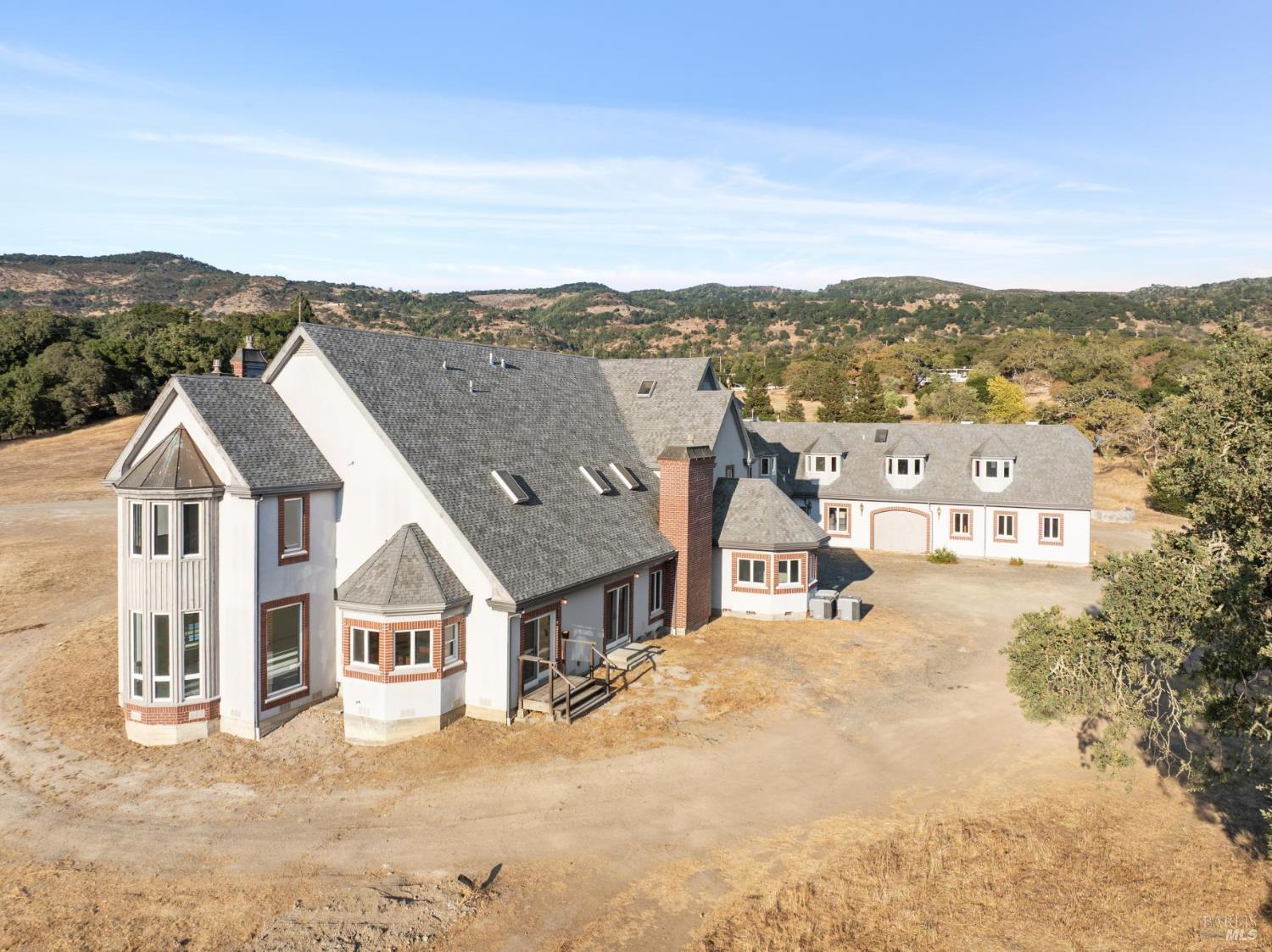 5151 Wild Horse Valley Road Napa, CA 94558 - Photo 24 of 81 an aerial view of residential houses with outdoor space and trees