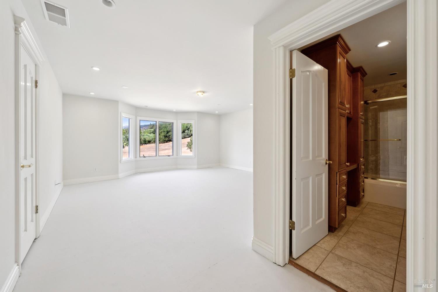 5151 Wild Horse Valley Road Napa, CA 94558 - Photo 58 of 81 a view of an empty room and a window