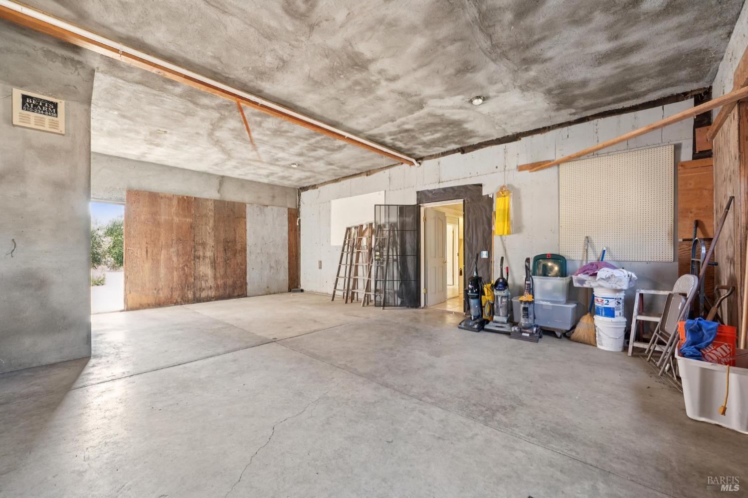 5151 Wild Horse Valley Road Napa, CA 94558 - Photo 75 of 81 a view of a room with furniture and a window