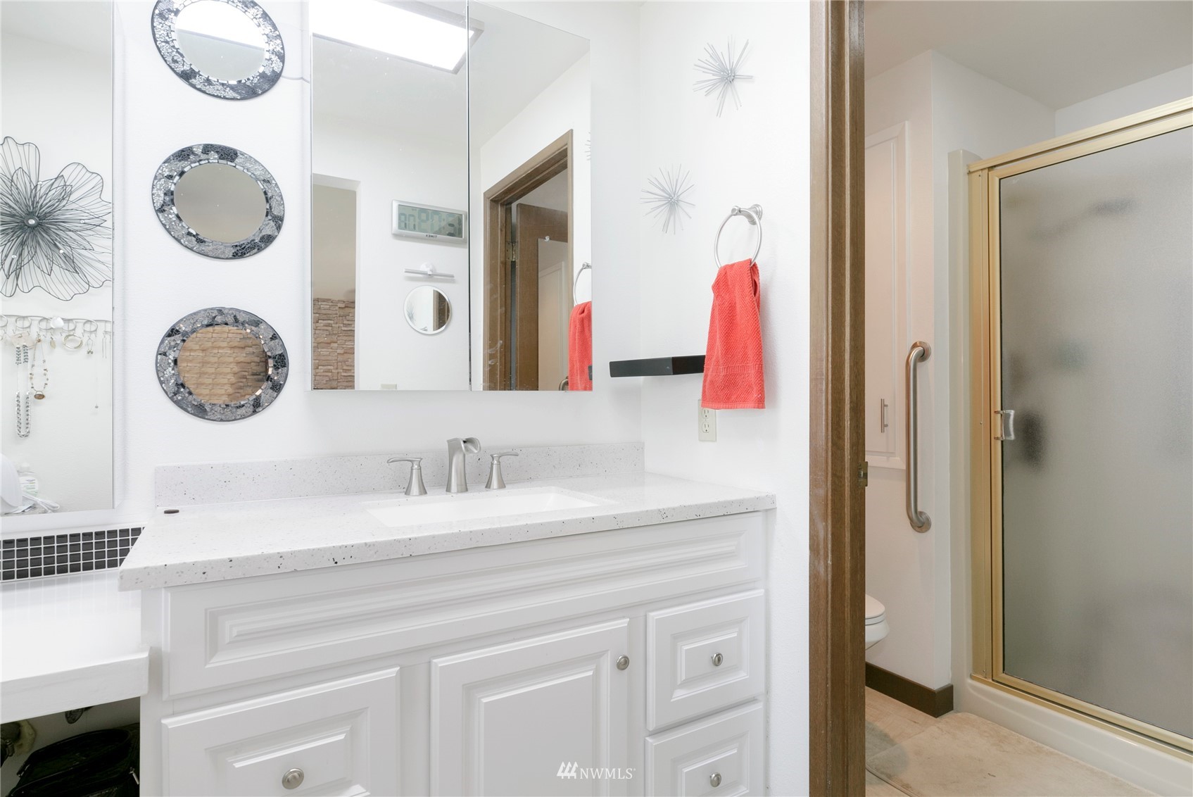 24 Burning Tree Drive Yakima, WA 98902 - Photo 14 of 18 a bathroom with a sink and a mirror