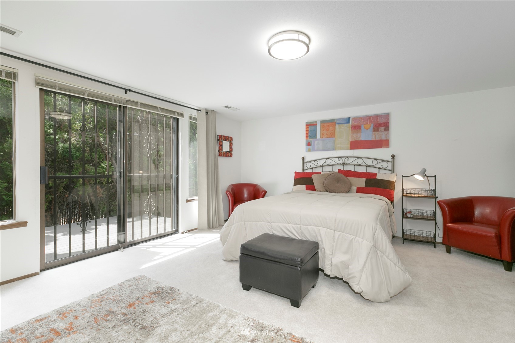 24 Burning Tree Drive Yakima, WA 98902 - Photo 16 of 18 a bedroom with a bed and glass window