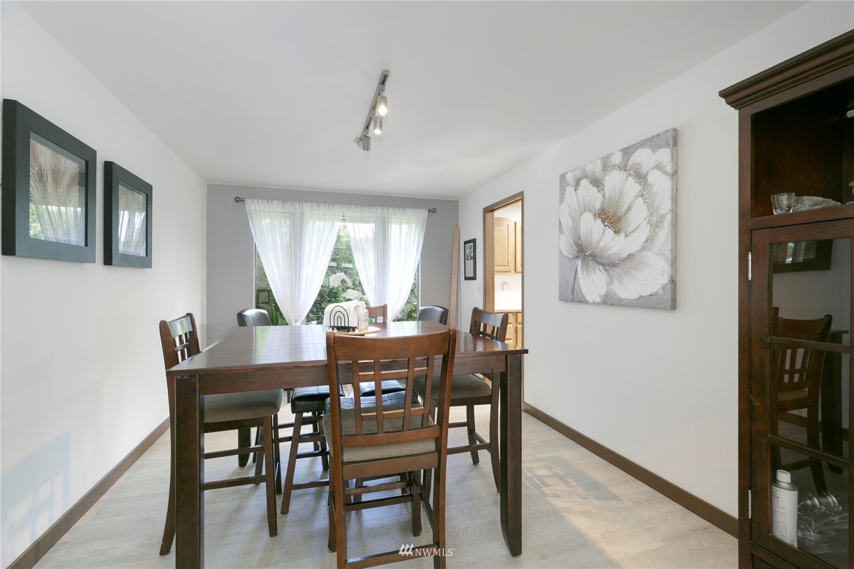 24 Burning Tree Drive Yakima, WA 98902 - Photo 7 of 18 a view of a dining room with furniture and chandelier