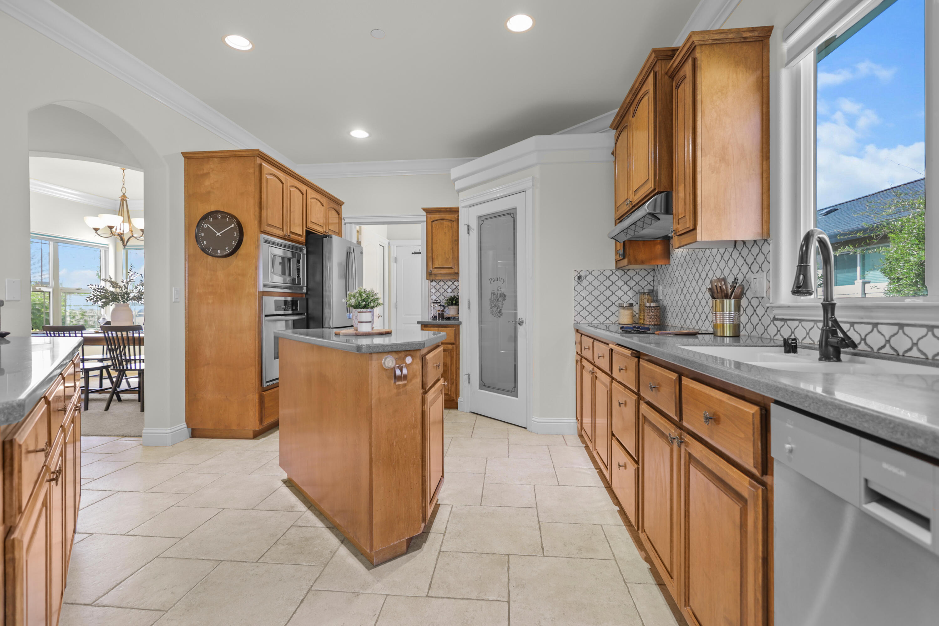 2110 Cadjew Street Redding, CA 96003 - Photo 12 of 62 a kitchen with refrigerator and cabinets