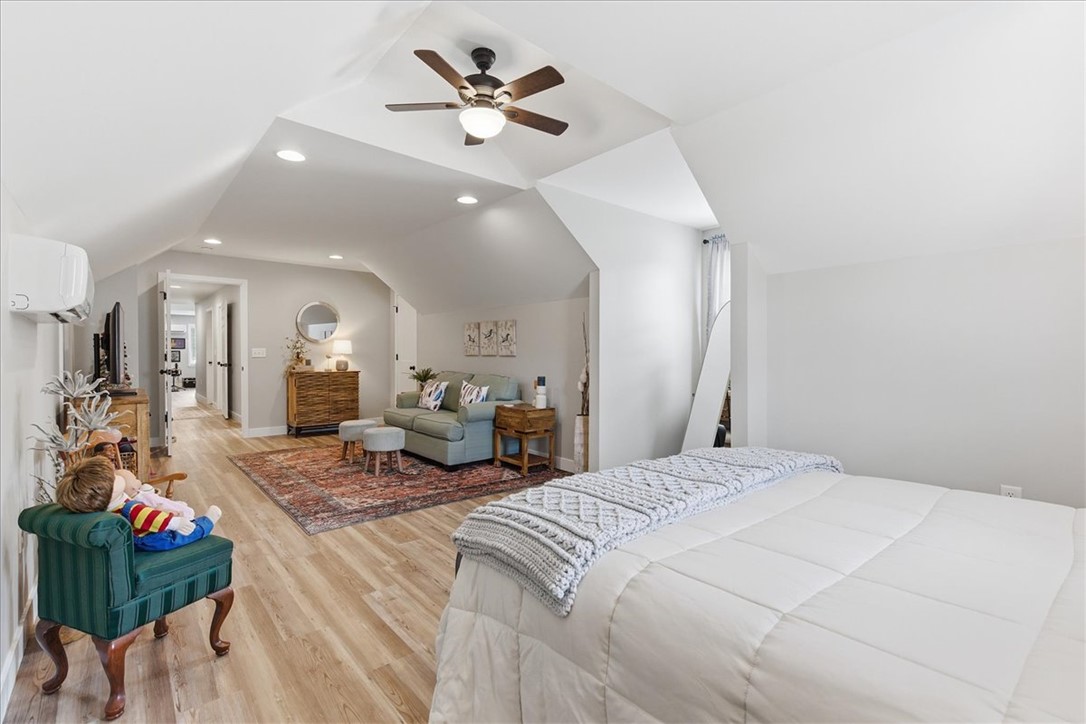 166 Amberwood Drive Anderson, SC 29621 - Photo 19 of 38 This spacious bedroom offers ample space for rest and relaxation.
