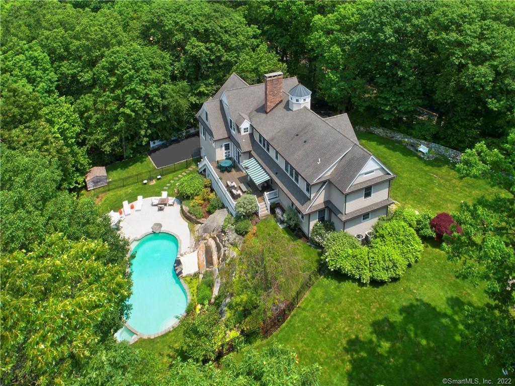 an aerial view of a house with a garden