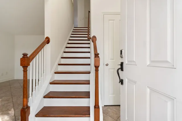 a view of staircase with lots of windows