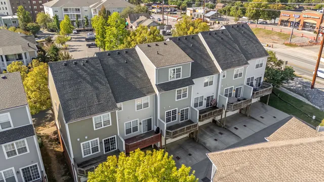 a view of a two chairs in the patio