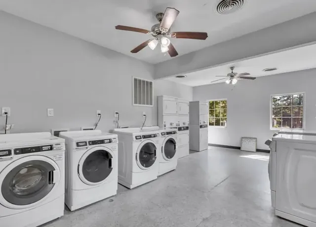 a view of kitchen with washer and dryer