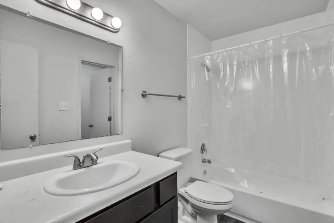 1401 Longcreek Drive Columbia, SC 29210 - Photo 9 of 9 a bathroom with a sink a toilet and shower