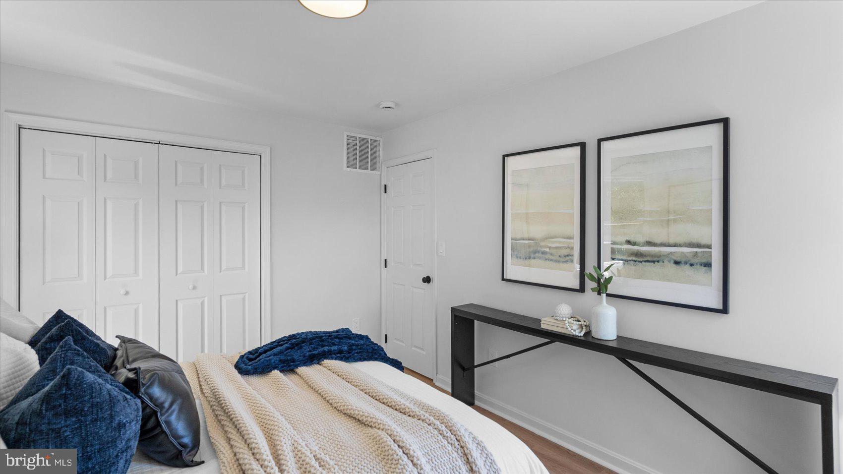 804 Suburbian Road Reisterstown, MD 21136 - Photo 20 of 36 a bedroom with a bed and a window