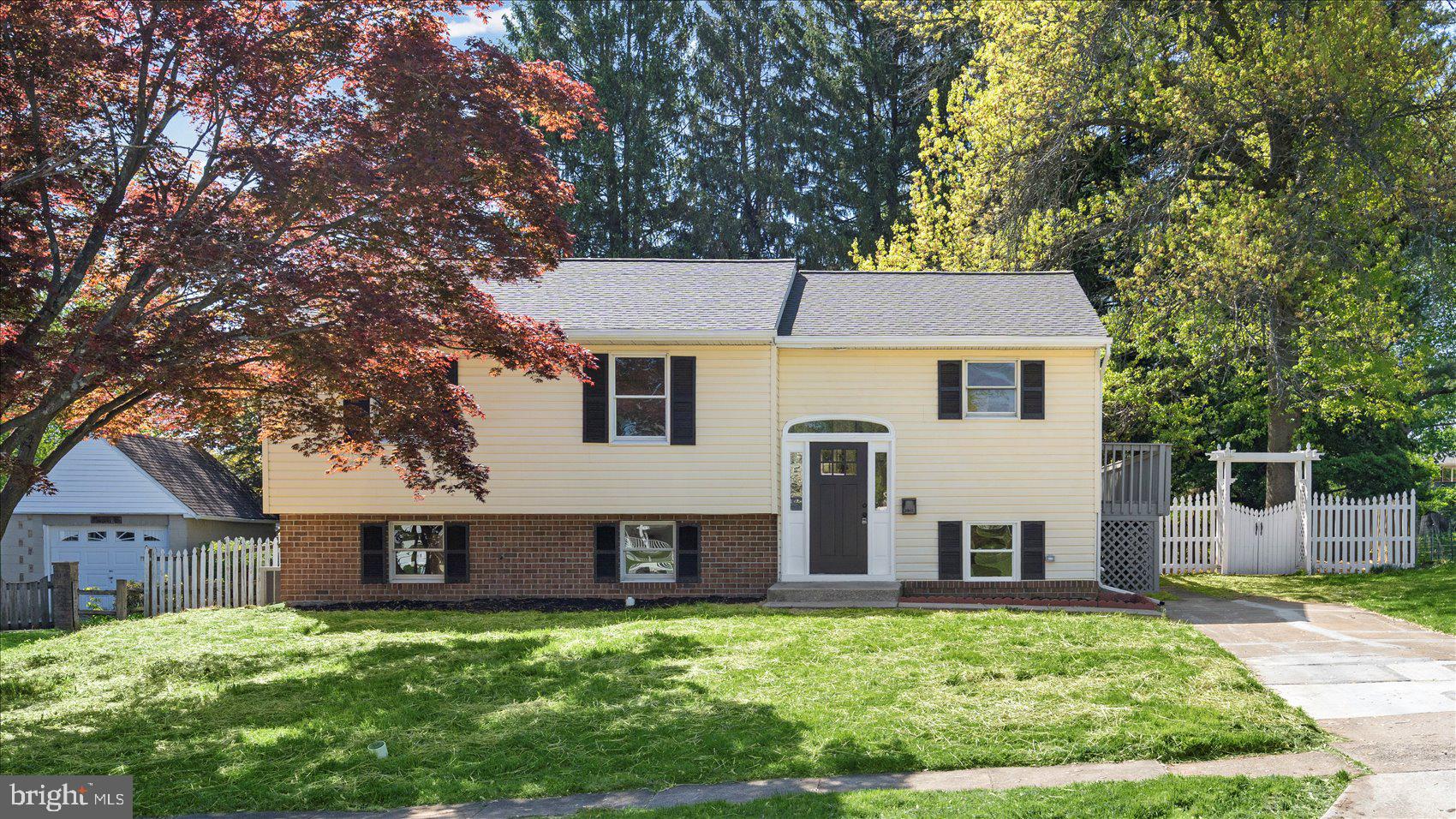 804 Suburbian Road Reisterstown, MD 21136 - Photo 2 of 36 a front view of a house with a yard