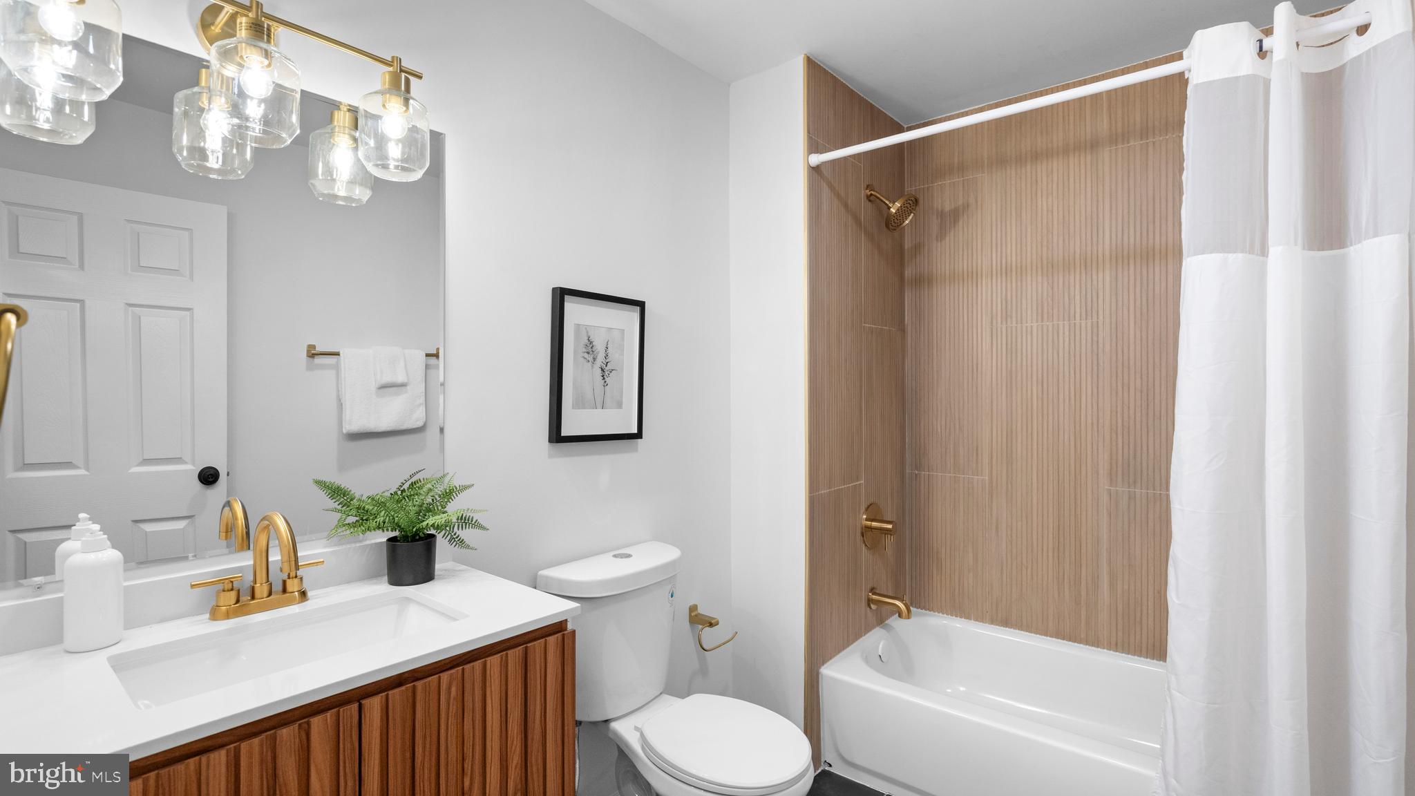 804 Suburbian Road Reisterstown, MD 21136 - Photo 23 of 36 a bathroom with a sink toilet and shower