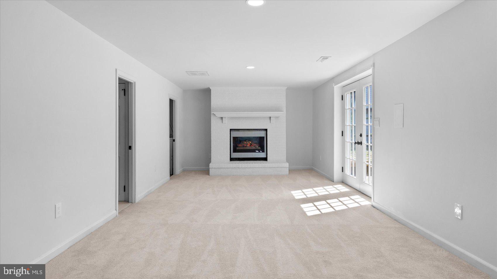 804 Suburbian Road Reisterstown, MD 21136 - Photo 24 of 36 a view of a big room with windows and fireplace