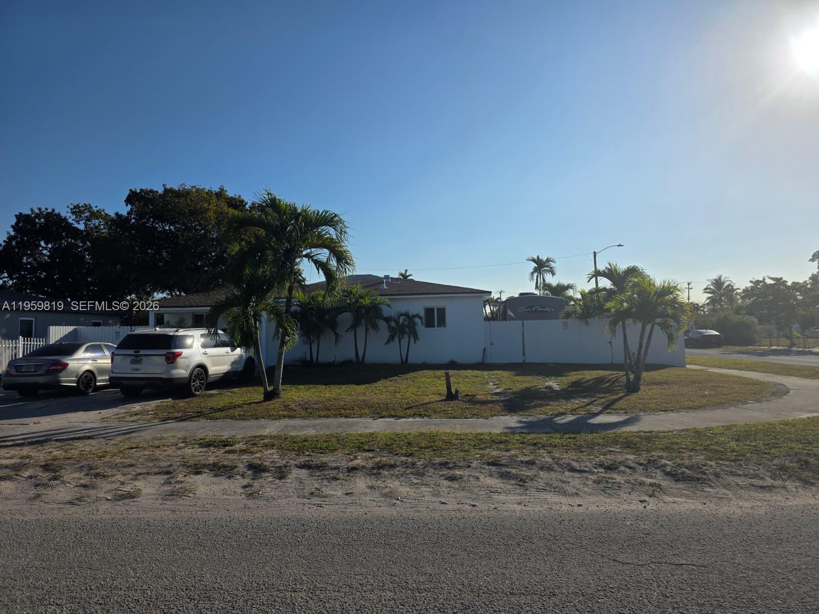 8523 Northwest 35th Place Miami, FL 33147 - Photo 1 of 10 a view of a yard with car parked