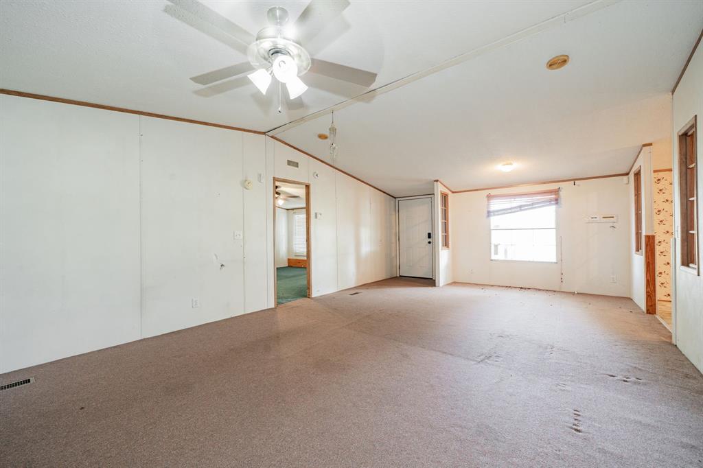 1312 Crowell Road Kaufman, TX 75142 - Photo 10 of 38 a view of an empty room with a window