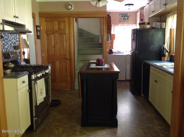 83 Town Hill Road Middlefield, MA 01235 - Photo 13 of 17 a kitchen with a sink stove and refrigerator