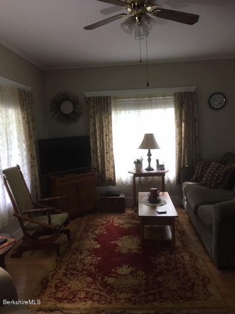 83 Town Hill Road Middlefield, MA 01235 - Photo 14 of 17 a living room with furniture and a flat screen tv