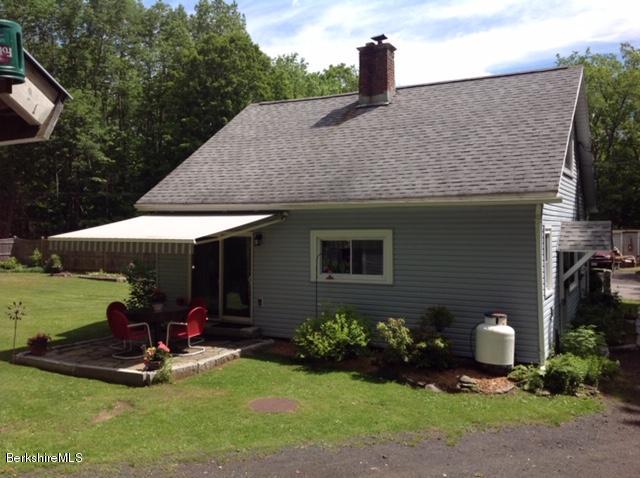 83 Town Hill Road Middlefield, MA 01235 - Photo 4 of 17 a view of a house with backyard and garden