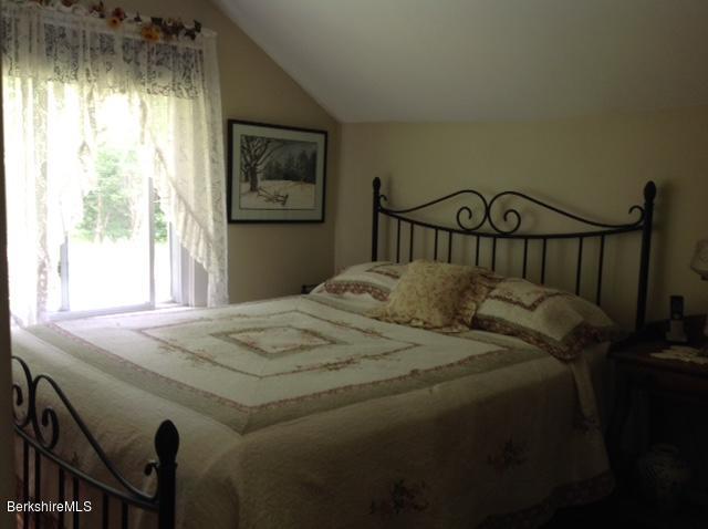83 Town Hill Road Middlefield, MA 01235 - Photo 5 of 17 a bedroom with a bed and a window