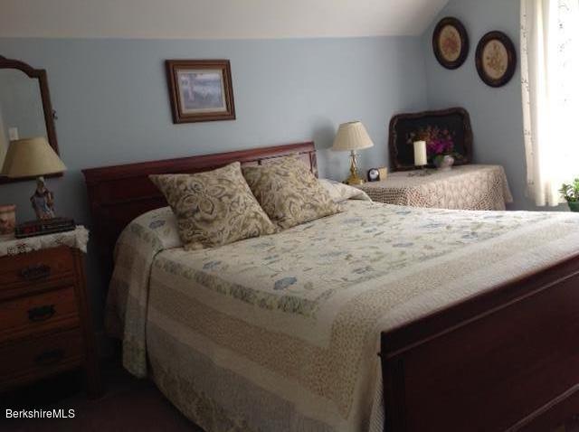 83 Town Hill Road Middlefield, MA 01235 - Photo 7 of 17 a bedroom with bed and a lamp on dresser
