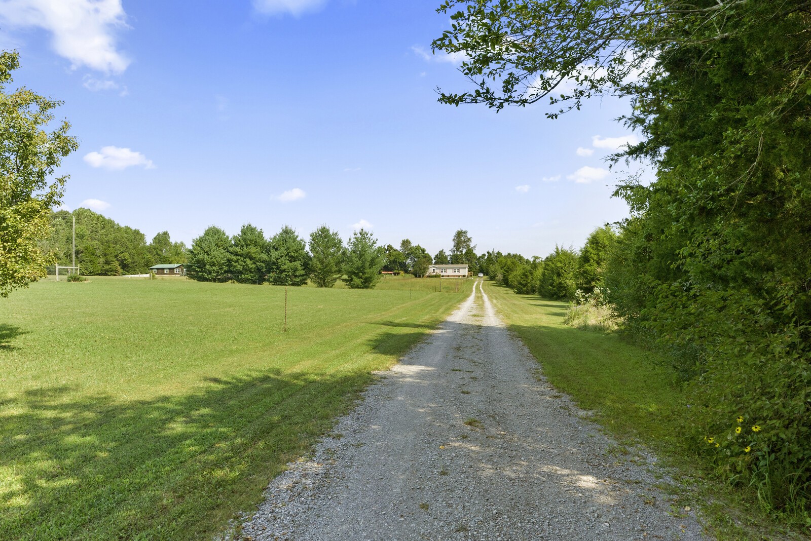 655 Shipper Road Lebanon, TN 37087 - Photo 22 of 32 a view of a lake with a big yard