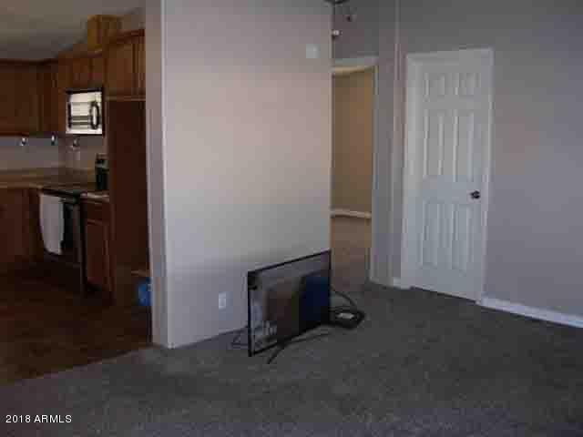 2137 South Tomahawk Road Apache Junction, AZ 85119 - Photo 5 of 26 living room