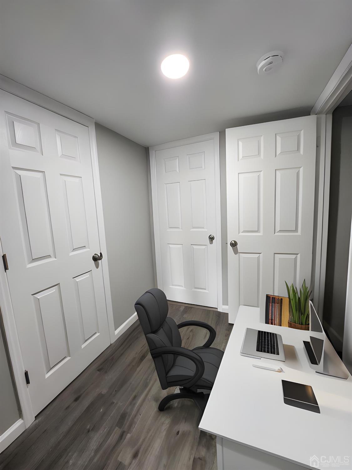 190 Berkeley Terrace Plainfield, NJ 07062 - Photo 12 of 23 a view of a workspace with furniture and wooden floor
