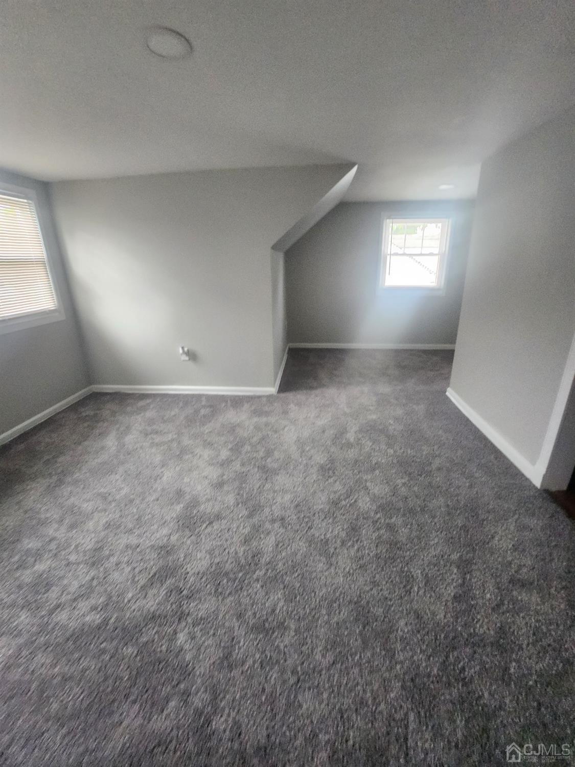 190 Berkeley Terrace Plainfield, NJ 07062 - Photo 15 of 23 an empty room with windows and closet