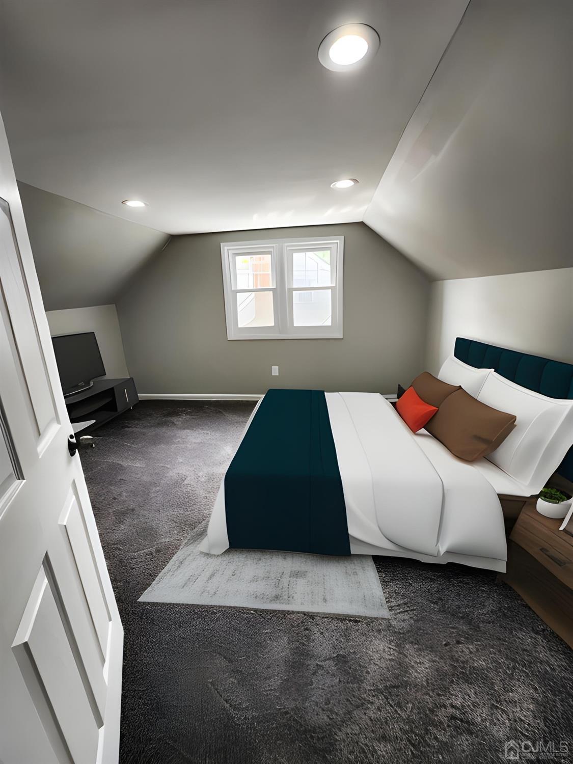 190 Berkeley Terrace Plainfield, NJ 07062 - Photo 18 of 23 a bedroom with a bed and a large window