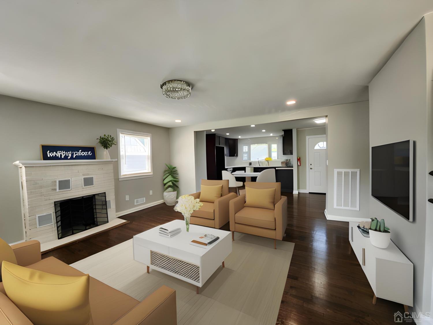 190 Berkeley Terrace Plainfield, NJ 07062 - Photo 2 of 23 a living room with furniture a fireplace and a flat screen tv