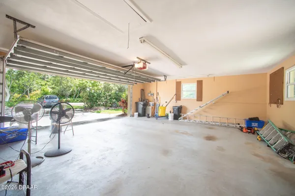 a view of empty room with windows