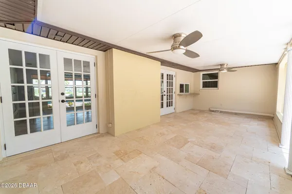a view of a swimming pool with a patio