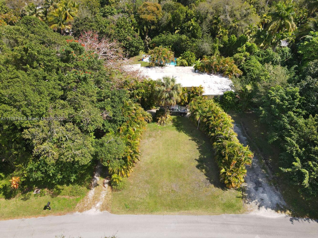 11301 Southwest 80th Road Pinecrest, FL 33156 - Photo 5 of 15 a view of a lake view