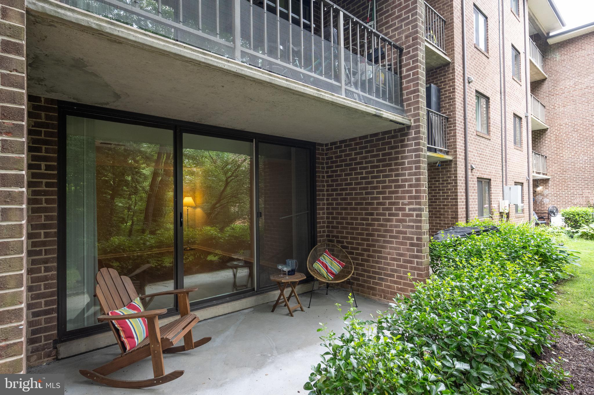 1403 Northgate Square, Unit 1B Reston, VA 20190 - Photo 11 of 23 Patio Opens to Green Space