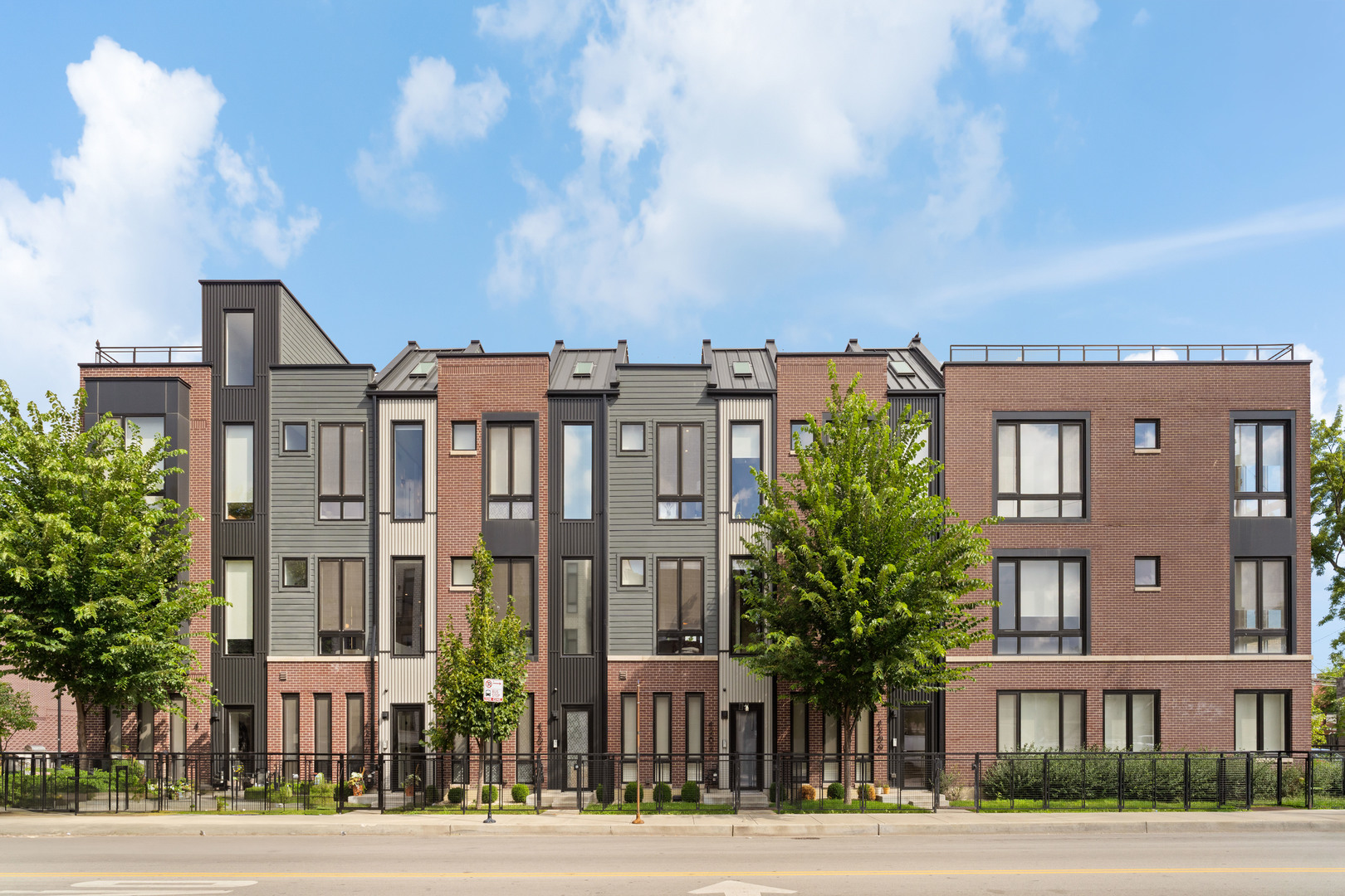 4232 West Belmont Avenue, Unit 2 Chicago, IL 60641 - Photo 1 of 35 a view of a city that has a lots of windows