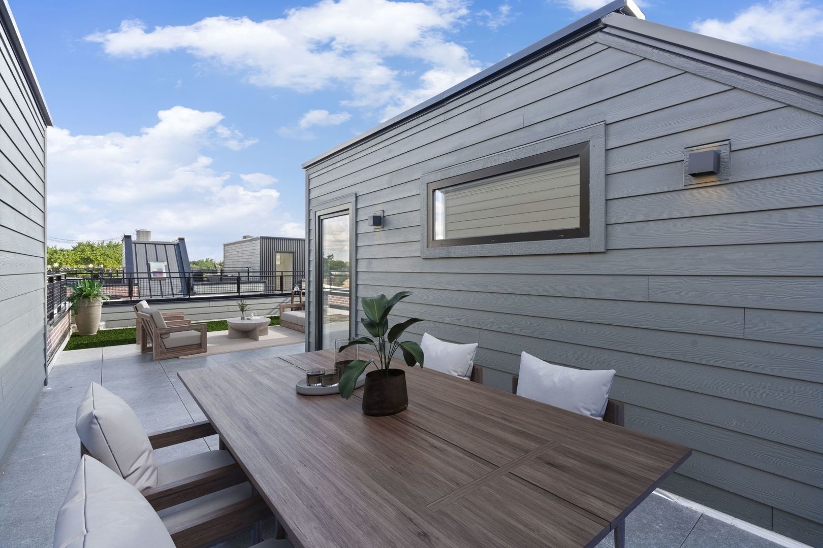 4232 West Belmont Avenue, Unit 2 Chicago, IL 60641 - Photo 30 of 35 a view of a roof deck with wooden floor