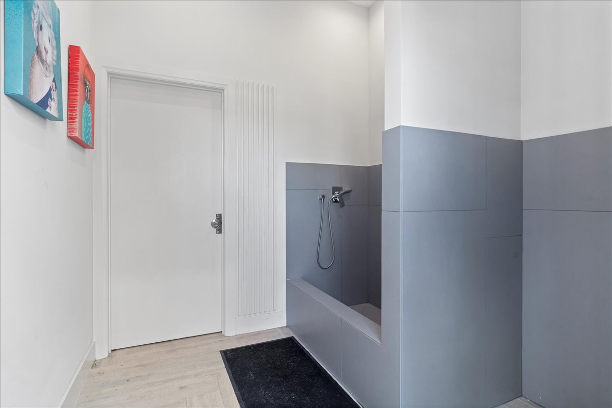 4232 West Belmont Avenue, Unit 2 Chicago, IL 60641 - Photo 34 of 35 a bathroom with a bathtub and shower